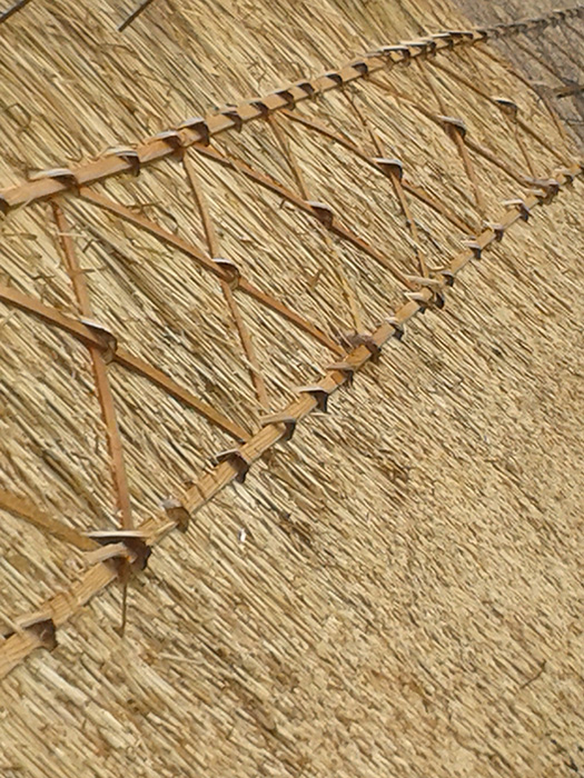 2 ridges joining thatch